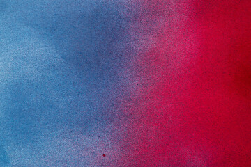 赤色と青色のスプレー塗料で塗った背景
