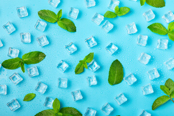 Mint and ice on texture background. Green fresh mint and ice cube. Mint leaves, ice cube and water...