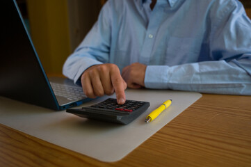 Man hands typing on computer keyboard closeup, businessman or student using laptop at office,...