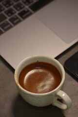 cup of coffee and laptop