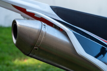Motorcycle exhaust pipe is shown in the image