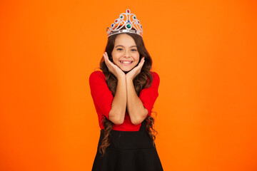 Party princess. Happy birthday. Birthday girl isolated on orange. Teen girl in crown at birthday...