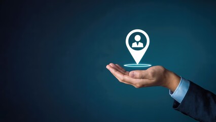 Hand holding customer location marker against a dark blue background showcasing business placement