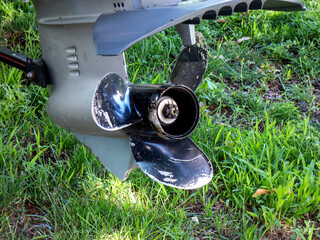 The propeller on the lower unit of an outboard motor