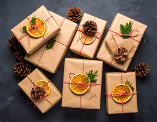 Creative gift wrapping with brown craft paper boxes adorned with red twine, pinecones, and dried orange for a festive occasion