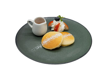 Delectable Pancake Delight: A visually appealing plate hosts fluffy pancakes dusted with icing...