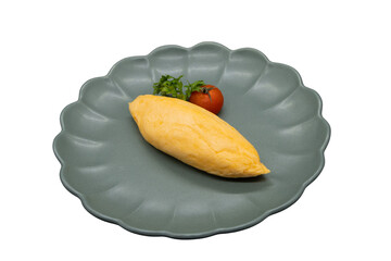 A culinary dream: The image showcases a delectable omelet, artfully arranged on a stylish, grey...