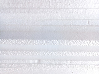 White tiled translucent foam texture or background. White Styrofoam texture. High quality photo....