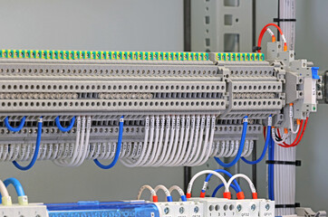 Electrical terminals with connected insulated copper wires with metal lugs. Marking with a thermal...