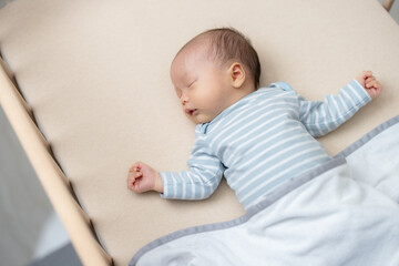 Newborn baby sleep on crib