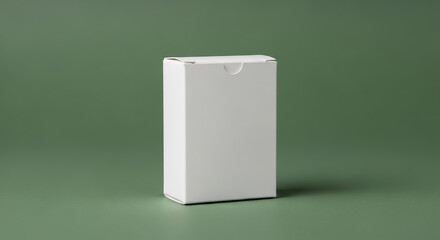 A real white vertical product box mockup for packaging on a solid green background.