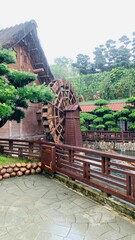 traditional house with water wheel