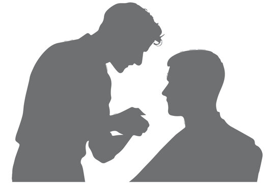 Silhouette of a professional hairstylist performing a haircut on a client, demonstrating expert hair cutting technique in a barbershop or salon setting