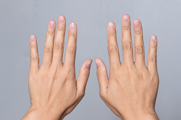 Hands with Neutral Pose Against Plain Background for Stock Photo Use