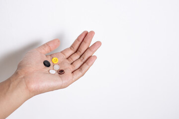 Hand Holding Colorful Buttons for Craft Projects and DIY Activities