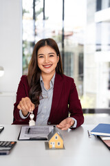Smiling female. confident professional realtor offering new dwelling real estate unit to buyer....