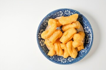 chinese donut, youtiao, chinese breadstick on white background,thai called patongo