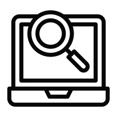 A laptop computer screen displays a magnifying glass over it