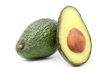 Fresh avocado cut in half to reveal the flesh and seeds. isolated on white background.