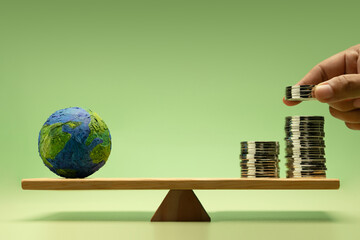 Global investment concept with Coin money Stack and Globe balanced on a scale, representing Global financial and Uncertainty Economic
