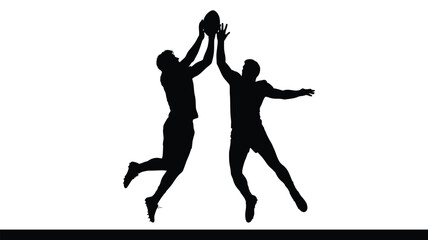 Silhouette of two football players jumping to catch the ball
