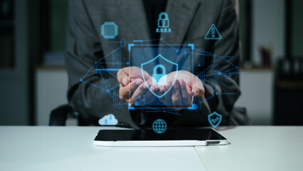 Woman holding smartphone with holographic lock and data network graphics. Concept of cybersecurity,...