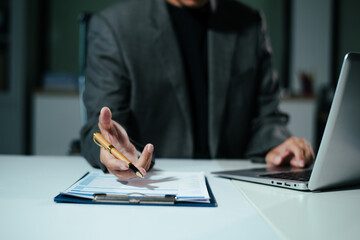 businessman using a stylus with digital tablet in office. Concept of smart technology, remote work