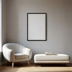 Modern minimalist interior with a comfortable white armchair and a sleek ottoman against a neutral gray wall featuring a blank framed picture for custom artwork