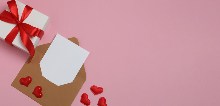 gift box with red ribbon and bow