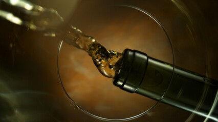 Pouring White Wine into Glass, Macro Shot. Unique Composition Shot from Inside of the Glass.