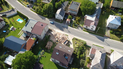 Demolition and construction work during the removal of an old building in a village. Heavy...