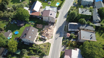 Demolition and construction work during the removal of an old building in a village. Heavy...