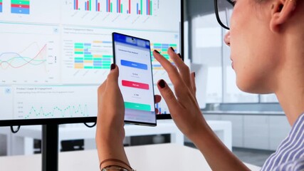 Female Data Analyst Examining KPI Analytics - Powered by Adobe