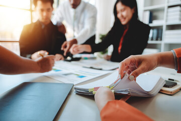 Brainstorming with colleagues on paperwork, marketing, taxes, and company finances.