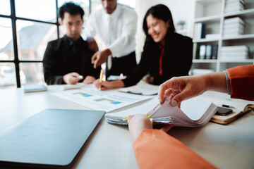 Brainstorming with colleagues on paperwork, marketing, taxes, and company finances.