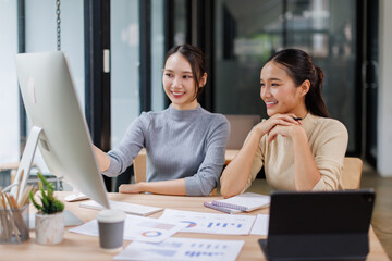 Two business women meeting with analytics in office as web developer in internship, workshop and company. Team, collaboration and digital agency for metrics, growth or career in brand design
