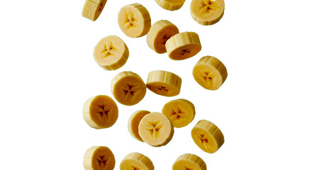 Obraz premium Freshly sliced ripe bananas frozen in mid-air creating a vibrant, healthy, and dynamic food composition perfect for culinary projects.