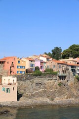 Colourful house fronts in Mediterranean seaside town of Collioure in Pyrénées-Orientales...
