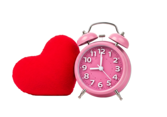 A red heart shape next to a pink alarm clock isolated on transparent background