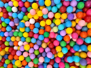 Colorful plastic balls in playground. Vibrant and playful background perfect for kids and fun designs.