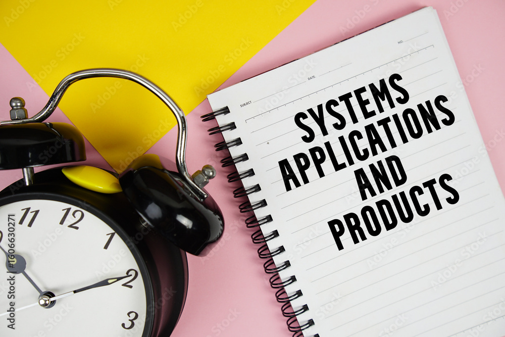 Poster sap systems applications and products text written on notepad with alarm clock on pink background