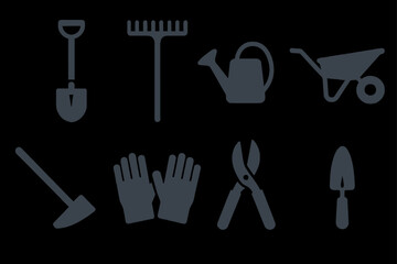 Silhouette of essential gardening tools on black background