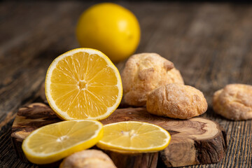 biscuits with pieces of yellow lemon, yellow lemon and shortbread biscuits with citrus flavor,...