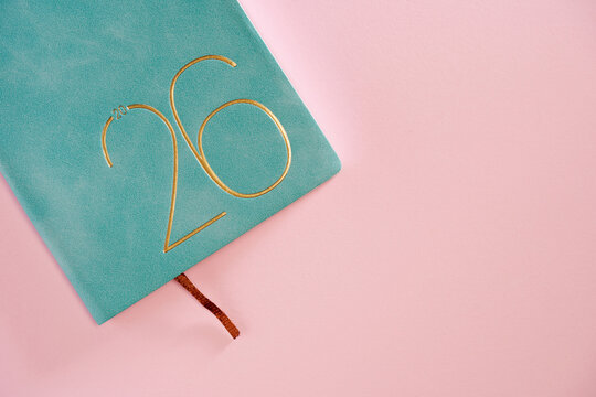 2026 planner  against pink background.