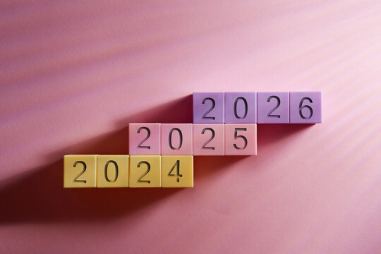 Number 2024, 2025 and 2026 on toy block staircase