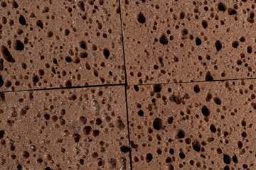 sponge for washing dishes or other objects, a synthetic sponge with lots of holes for good foaming...