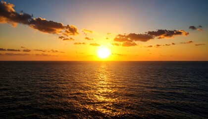 Fototapeta premium Golden sunset over a vast ocean