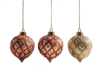 Three patterned Christmas ornaments, hanging, in red/orange, gold/beige