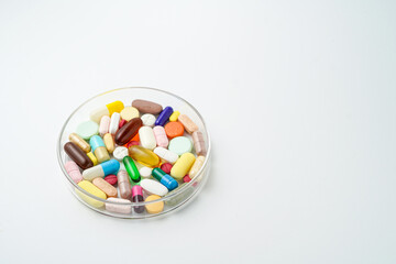 Clock made of pills capsules, pills form a circle, omega, vitamins, Cod liver oil, supplements