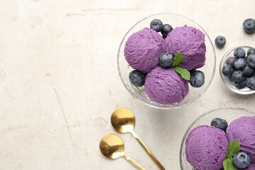 Tasty sorbet with blueberries and mint on light grey table, flat lay. Space for text